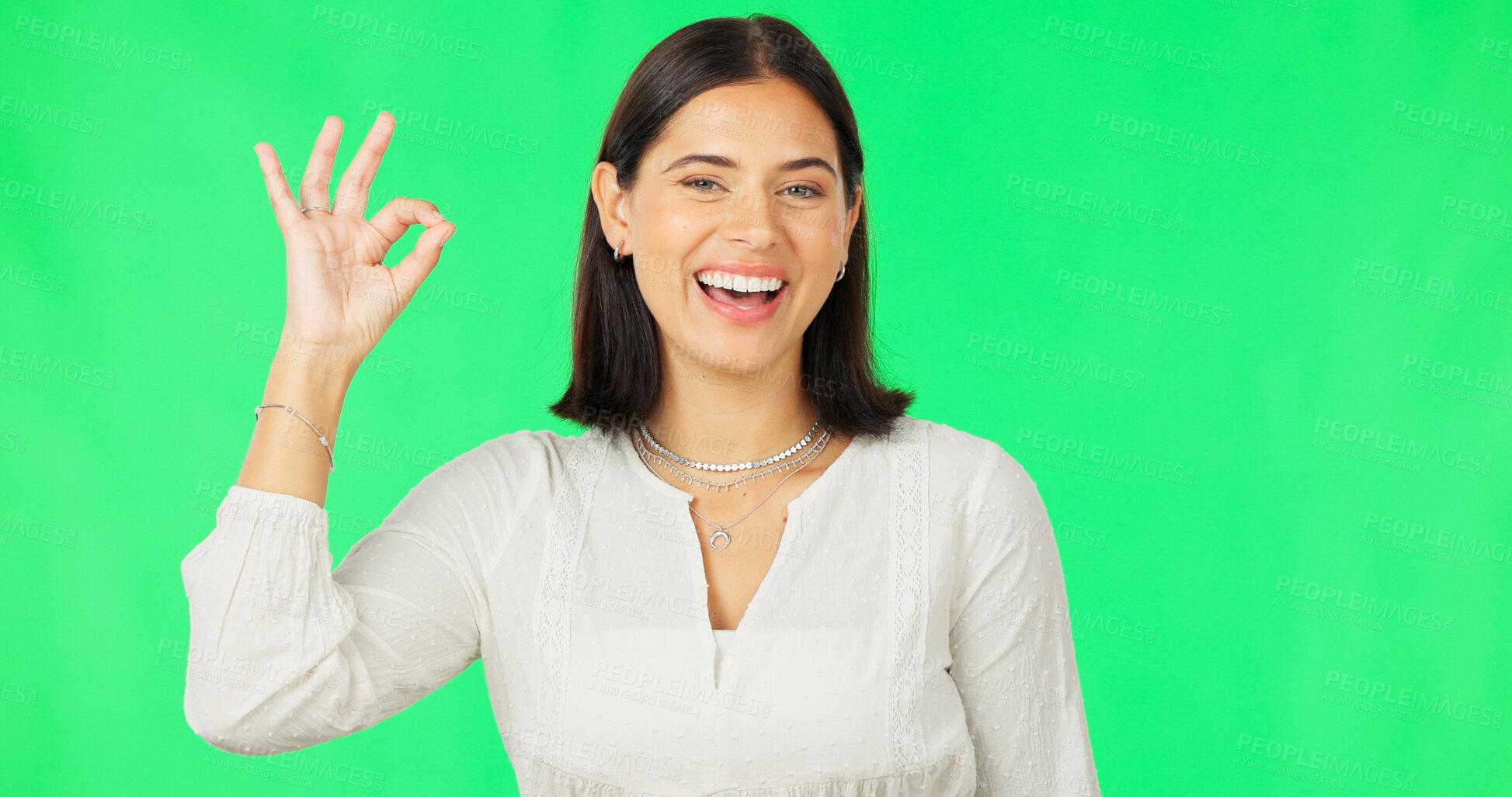 Buy stock photo Okay hand sign, face and happy woman on green screen for opinion, vote or feedback. Portrait of model with smile, ok gesture and review icon with good news, thank you and agreement emoji in support.