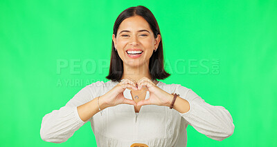 Buy stock photo Portrait, heart hands and woman with green screen, feedback and review on a studio background. Face, happy person and model with promotion, symbol for love and kindness with icon, emoji and support