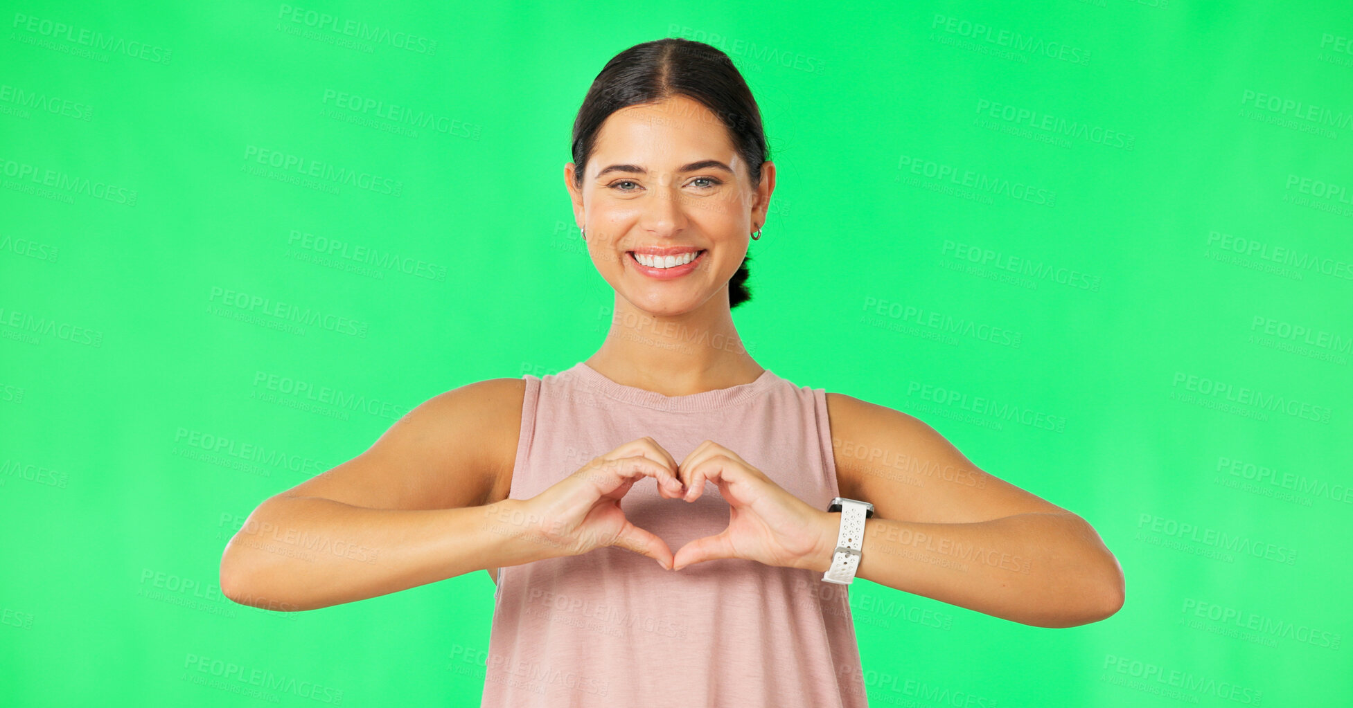 Buy stock photo Portrait, heart hands and woman with green screen, support and promotion on a studio background. Face, happy person and model with fitness, symbol for love and feedback with icon, emoji and review