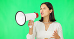 Megaphone, protest and woman green screen for broadcast, justice and strong opinion, voice or announcement. Person, speaker or angry leader in politics, news and call to action with speech in studio