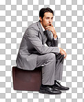 A thoughtful businessman sitting on his briefcase while isolated on a png background