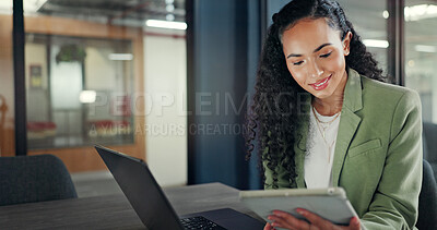 Office laptop, tablet and happy woman reading financial portfolio, stock market review or investment feedback. Forex economy, trading or African trader smile for NFT, bitcoin or crypto revenue report