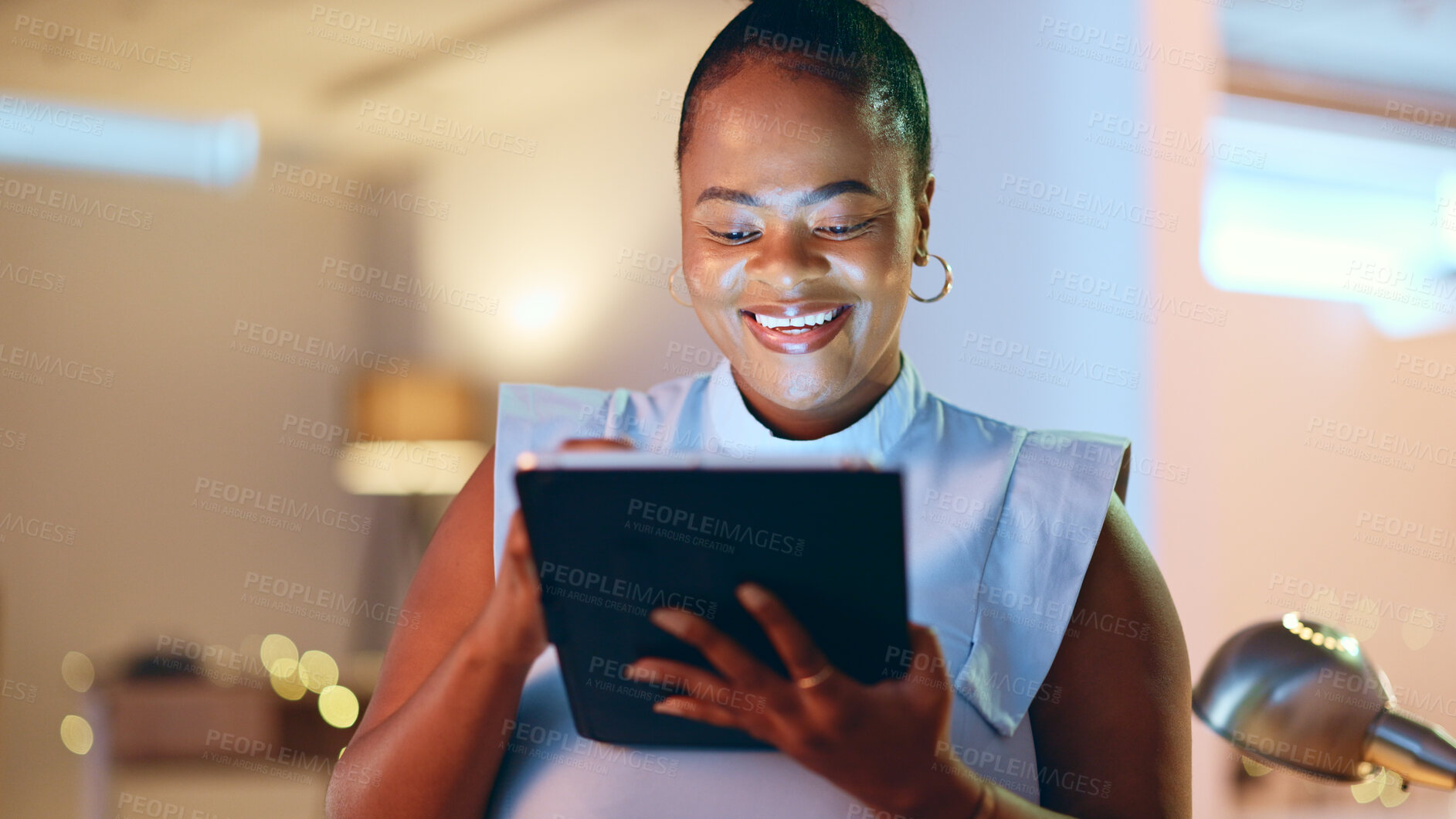 Buy stock photo Smile, business and black woman on tablet in office, working on online project, report and website at night. Corporate, happy and female worker with idea, digital tech and reading screen for research