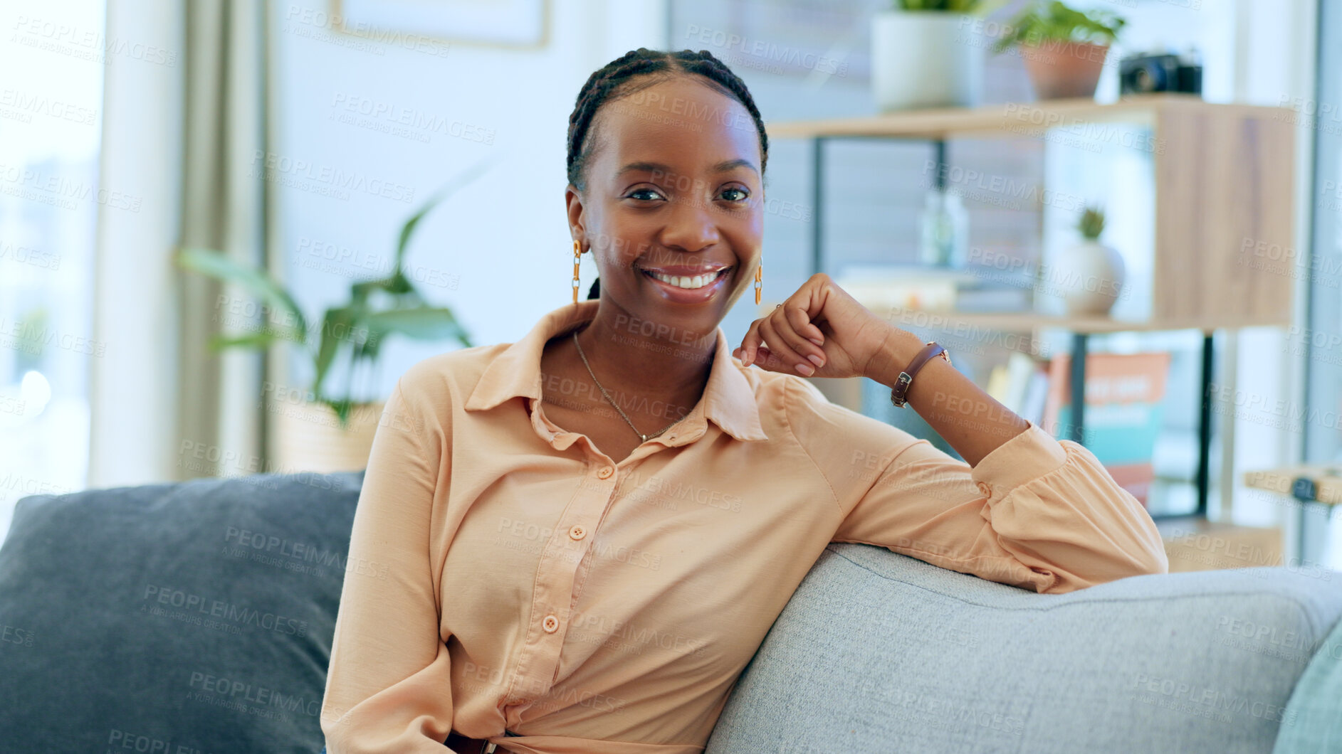 Buy stock photo Relax, black woman and portrait on the sofa in house as homeowner, real estate investor or mortgage loan buyer. Smile, happy or an African person on living room couch or apartment property furniture