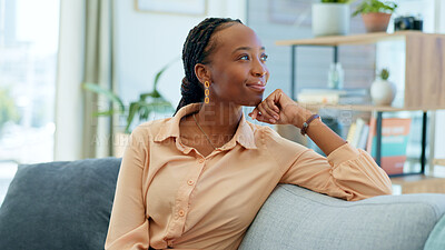Relax black woman, laughing or portrait on sofa in house as homeowner, real estate investor or mortgage loan buyer. Smile, happy or funny person on living room couch or apartment property furniture