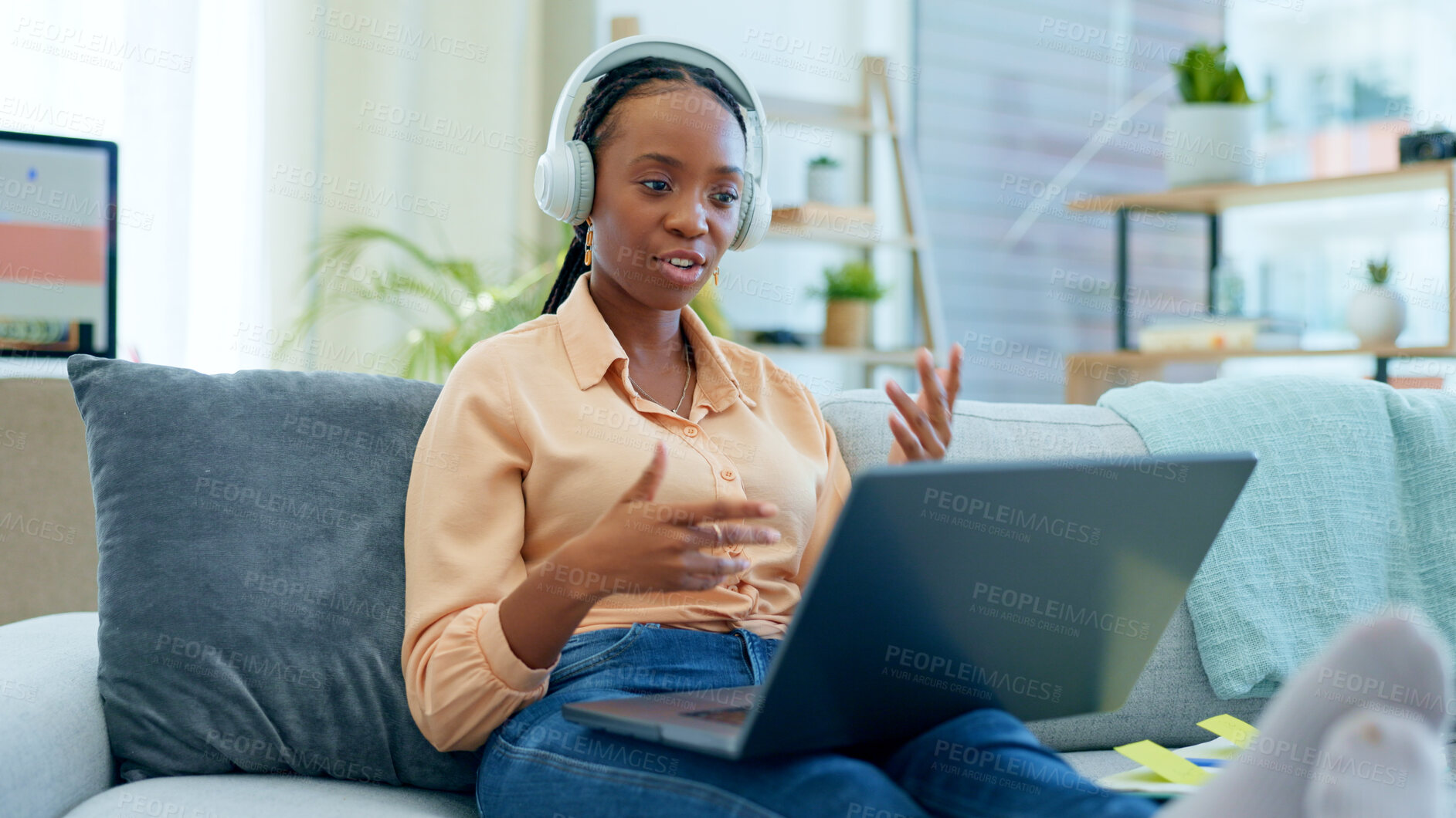 Buy stock photo Video call, laptop and black woman doing remote work presentation on couch in a home on webinar. Sofa, information and freelancer working with online technology in apartment for consultation