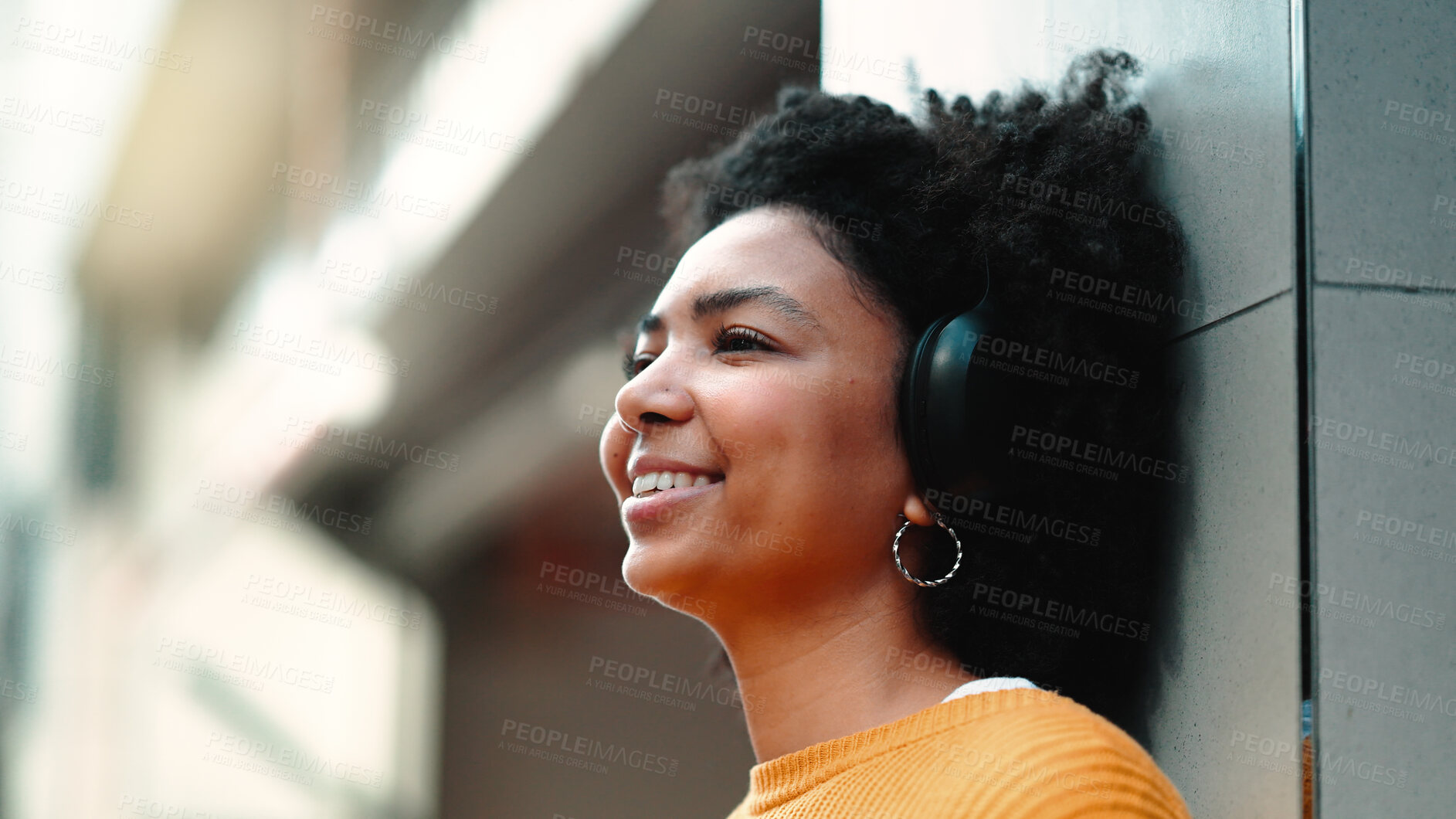 Buy stock photo Woman, headphones and smile for music in street, city or thinking for vision, sound tech or freedom. African girl, audio streaming subscription and listen for memory, podcast or radio in metro road