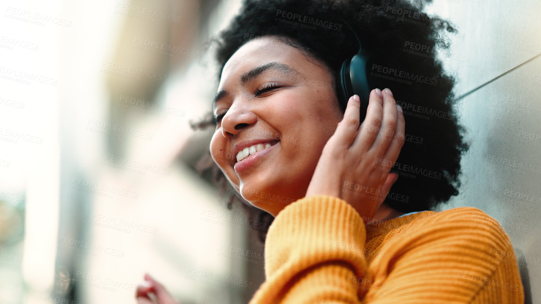 Buy stock photo Woman, headphones and happy music in street, city and thinking with eyes closed, sound tech and freedom. African girl, audio streaming subscription and happy for listening, podcast or radio in metro