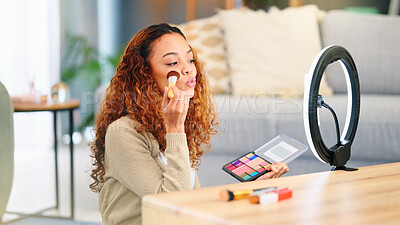 Buy stock photo Influencer woman, makeup and ring light in home with brush, foundation and recording tutorial by table. Girl, cosmetics video and live streaming for beauty, content creation and social media in house