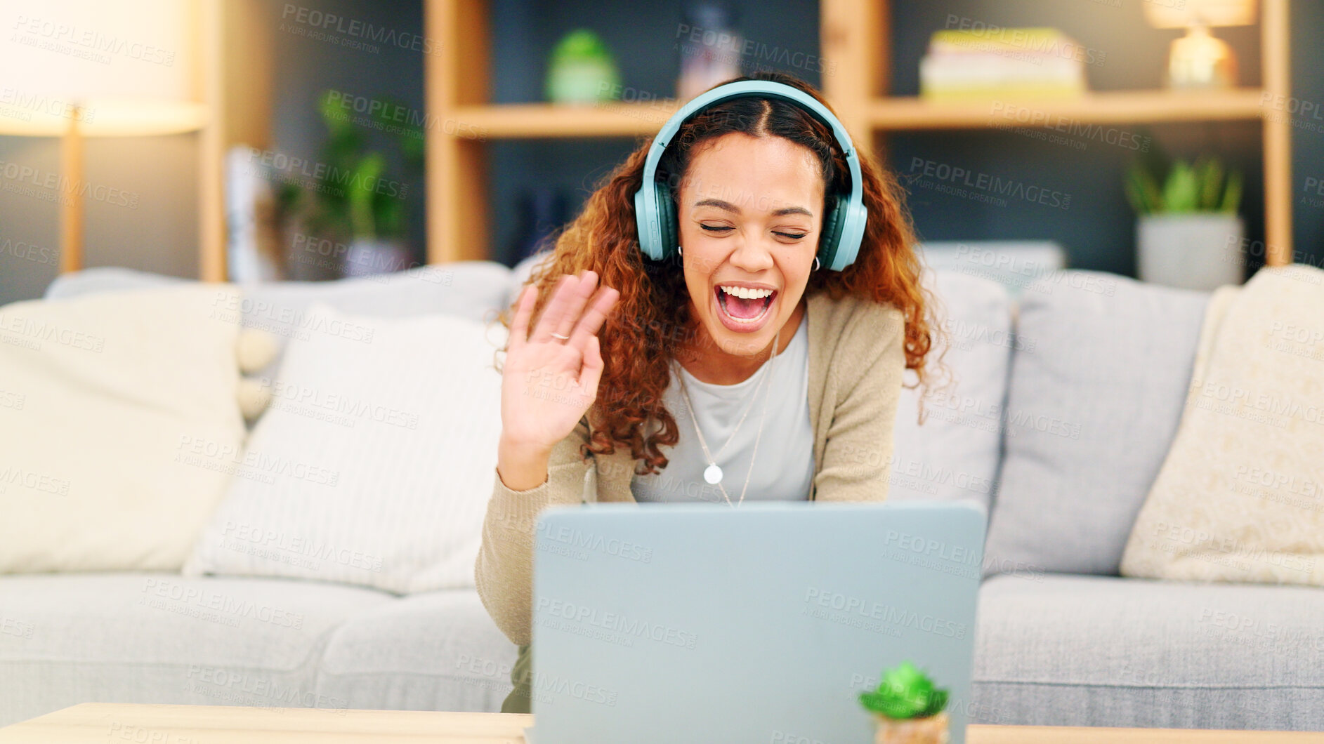Buy stock photo Headphones, laptop and woman on a video call to connect and online communication in home living room with internet. Happy, wave and young person talking and relax on chat website or app with contact