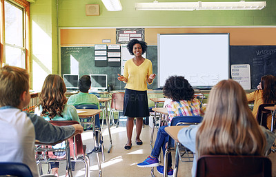 Buy stock photo Education, school and a teacher black woman in a classroom with student children for learning. Scholarship, study and child development with African female educator teaching kids during class lesson