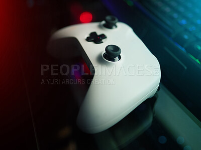 Buy stock photo Closeup of video game controller, technology to play games and online streaming with esports and gaming gadget. Gamer tools, tech on desk and live stream with digital world and streamer joystick