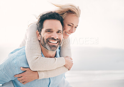 Buy stock photo Beach, piggyback and portrait of couple with smile on holiday, vacation and weekend for anniversary. Love, marriage and happy mature man carry woman for bonding, quality time and happiness by ocean