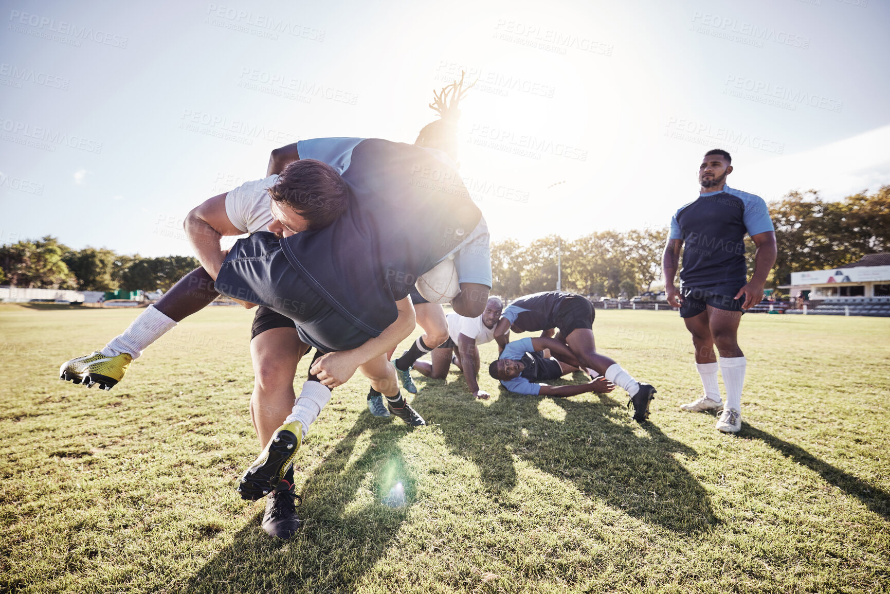 Buy stock photo Sports, rugby and men tackle on grass for match, practice and game in tournament or competition. Fitness, teamwork and players playing for exercise, training and performance to win ball on field