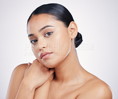 Buy stock photo Skin, face and beauty of a woman in studio for glow, dermatology and cosmetics. Portrait of aesthetic female person with natural shine, facial self care or health and wellness on a white background