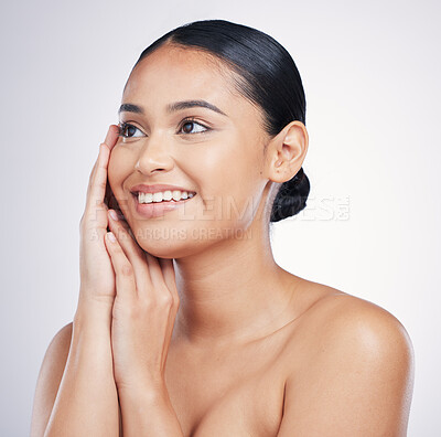 Buy stock photo Beauty, smile and woman with hands on face in studio for glow, dermatology or natural cosmetics. Happy aesthetic model person thinking of self care, facial or skincare results on a white background