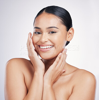 Buy stock photo Natural, beauty and woman with hands on face in studio for glow, dermatology or cosmetics. Portrait of a happy aesthetic model person with self care, facial or skincare results on a white background