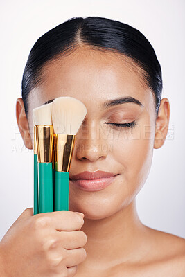 Buy stock photo Brush for makeup, face and beauty with woman, foundation and powder isolated on studio background. Closeup of female model, natural cosmetics and skin glow with cosmetic tools and cosmetology