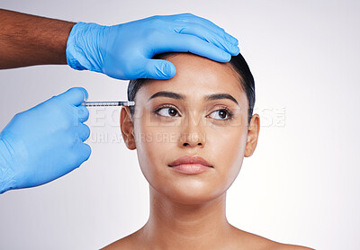 Buy stock photo Facial injection, beauty and skincare with woman, cosmetic treatment and filler isolated on studio background. Doctor hands, needle and female model face with dermatology, cosmetics and skin facelift