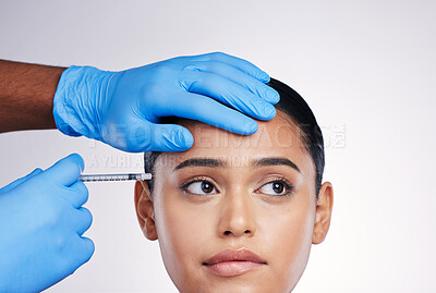 Buy stock photo Woman, studio and injection with hands, surgery or worry with thinking, doubt or collagen by white background. Girl cosmetic surgeon and filler with idea, pain or fear for beauty, skincare or change