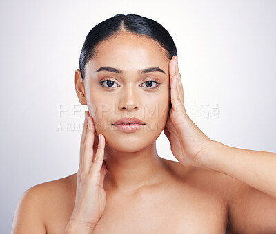Buy stock photo Beauty, skin and woman with hands on face in studio for glow, dermatology or natural cosmetics. Headshot of aesthetic model person with self care, facial or skincare results on a white background