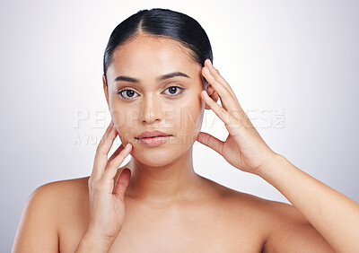 Buy stock photo Beauty, skin and woman with hands on face in studio for glow, dermatology or natural cosmetics. Portrait of aesthetic model person with self care, facial or skincare results on a white background