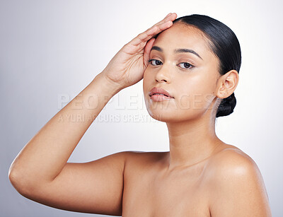 Buy stock photo Beauty, face and portrait of a woman in studio for skin glow, dermatology or natural cosmetics. Headshot of aesthetic model person with self care, facial or skincare results on a white background