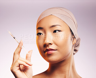 Buy stock photo Woman, face and plastic surgery with injection and studio background with asian for skincare. Female model, cosmetic and syringe for beauty, wellness and collagen for skin and closeup with filler.