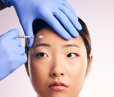 Buy stock photo Forehead injection, face skincare and Asian woman in studio isolated on a white background. Cosmetics, syringe and female model with collagen filler, dermatology and prp facelift in plastic surgery.