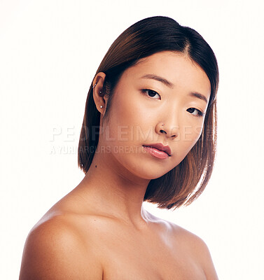 Buy stock photo Skincare, face portrait and Asian woman in studio isolated on a white background. Serious, natural beauty and female model with makeup, cosmetics and spa facial treatment for healthy or glowing skin.
