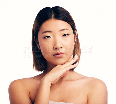 Buy stock photo Face portrait, skincare and beauty of Asian woman in studio isolated on white background. Serious, natural and female model with makeup, cosmetics and spa facial treatment for healthy or glowing skin