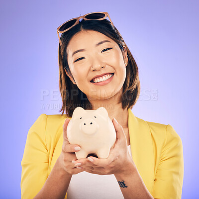 Buy stock photo Piggy bank, saving and portrait of Asian woman in studio for investment, financial profit and budget. Finance, banking and face of happy female person with money container for savings, cash and coins