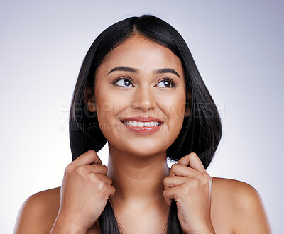 Buy stock photo Haircare, beauty and woman holding hair in hands, smile and luxury keratin strength treatment on white background. Face, haircut growth and happy latino model with strong hairstyle on studio backdrop