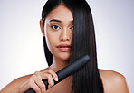 Hair, flat iron and portrait of woman with straight hairstyle, luxury salon treatment and white background in Brazil. Beauty, haircut and face of latino model with electric straightener in studio.