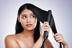 Hair, concern and woman with straightener, mockup and luxury salon treatment on white background in Brazil. Beauty, heat damage and hairstyle of latino model with flat iron, stress and studio space.