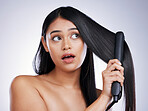 Haircare, flat iron and silly face of woman with long hair, heat and luxury salon treatment on white background in Brazil. Beauty, haircut and latino model with straight hairstyle on studio backdrop.