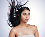 Hair care, wind and face of woman with mockup, luxury salon treatment and white background in Brazil. Beauty model, haircut and latino girl with straight, healthy hairstyle on studio backdrop space.