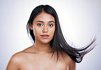 Hair care, wind and portrait of woman with mockup, long haircut and luxury salon treatment on white background in Brazil. Beauty, makeup and latino model with straight hairstyle on studio backdrop.