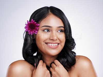 Buy stock photo Beauty, smile and face of happy woman with flower in hair, natural makeup and salon treatment on white background. Nature, hairstyle and flowers, face of latino model with haircare on studio backdrop
