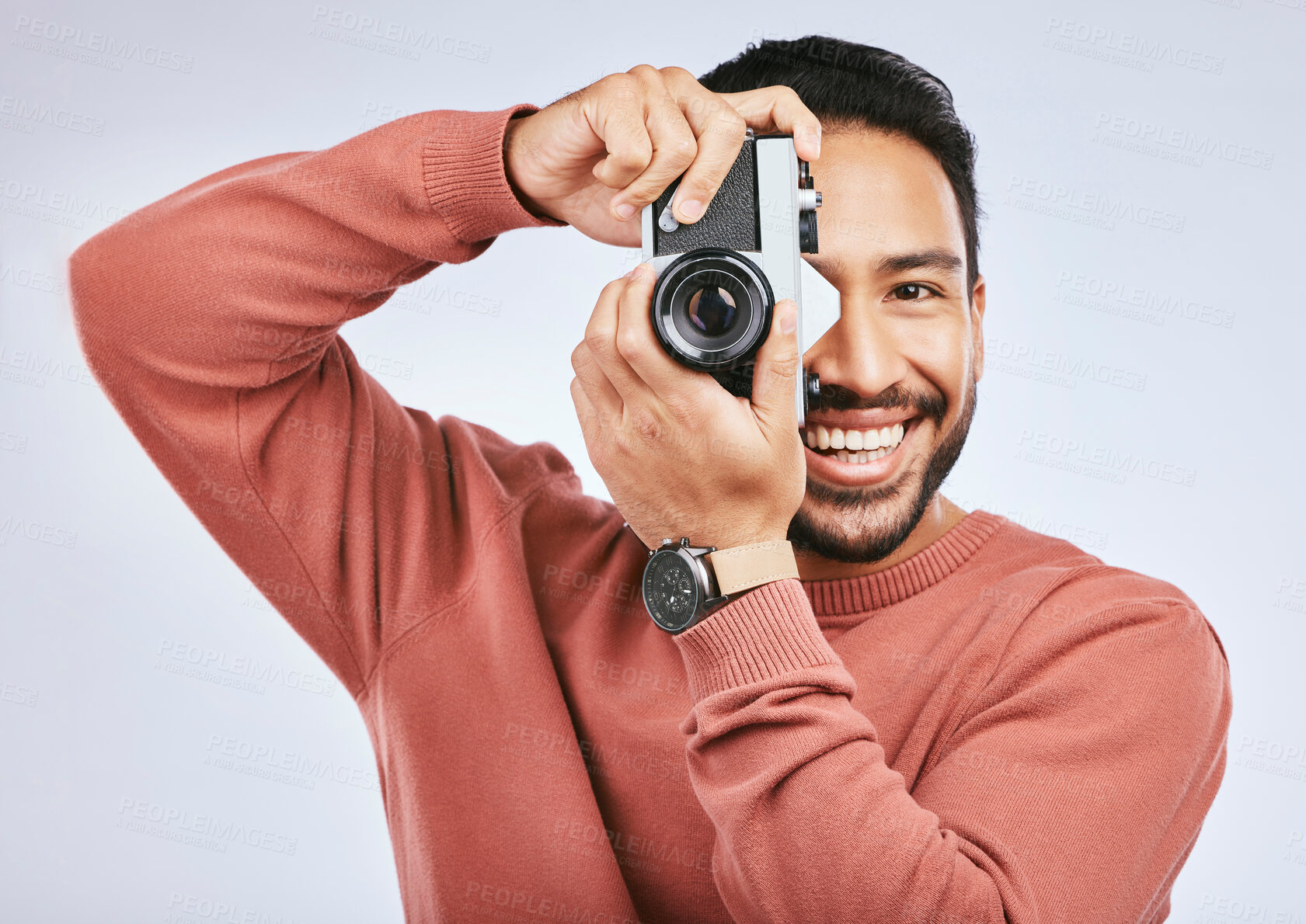 Buy stock photo Man with camera, photography and smile in portrait with creativity and art isolated on studio background. Happy male photographer, creative with artistic person and taking pictures with gadget