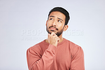 Buy stock photo Face, man and thinking of idea in studio or planning, decision and choice with white mockup background. Asian male, model and curious with doubt, questions or thoughtful guy, confused or remember
