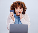 Credit card, laptop and a woman shocked or surprised with online shopping bill, scam or fintech payment. African female person with technology for e commerce mistake, security password or glitch