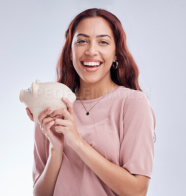 Buy stock photo Finance, portrait or happy woman with a piggy bank for financial wealth or savings on white background. Smile, investment or girl laughing or investing cash or budget in tin for safety or security