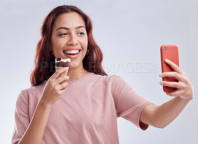 Buy stock photo Girl, ice cream and selfie with smile in studio for summer vacation, social media app and blog by white background. Woman, gelato or dessert with photography, profile picture and happy by backdrop