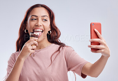 Buy stock photo Woman, ice cream and selfie with smile in studio for summer vacation, social media app and blog by white background. Girl, gelato or dessert with photography, profile picture and happy by backdrop