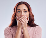 Portrait, secret and woman with a surprise, cover mouth and announcement against a studio background. Face, female person and model with gossip, shock and hands on lips with worry, reaction and omg