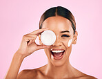 Happy woman, portrait smile and face cream for skincare or beauty moisturizer against a pink studio background. Female person or model smiling for lotion, cosmetic creme products or facial treatment