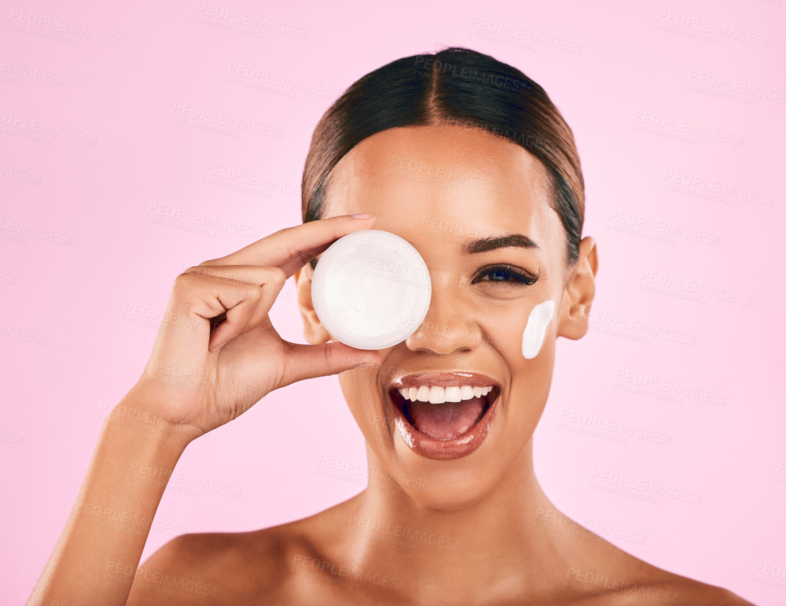 Buy stock photo Happy woman, portrait smile and face cream for skincare or beauty moisturizer against a pink studio background. Female person or model smiling for lotion, cosmetic creme products or facial treatment