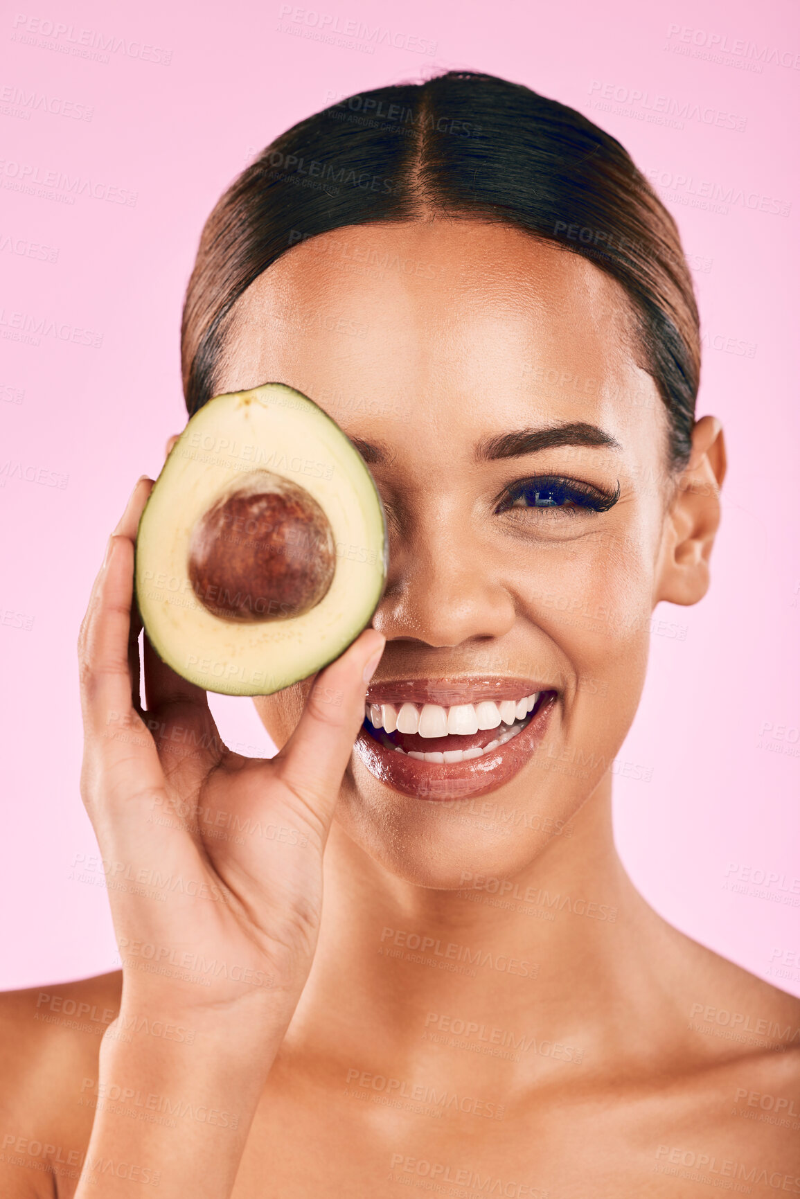 Buy stock photo Happy woman, portrait and avocado for natural skincare, beauty or cosmetics against a pink studio background. Female person or model smile with vegetable for healthy nutrition, fiber diet or wellness