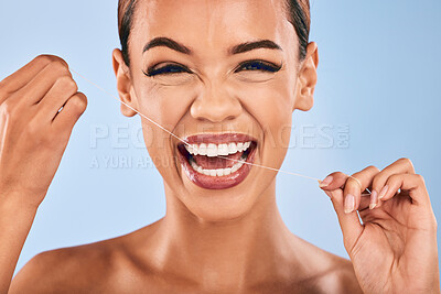 Buy stock photo Happy woman, portrait and flossing teeth in dental, clean hygiene or healthcare against a studio background. Female person or model with smile in tooth whitening, floss or oral, gum or mouth cleaning